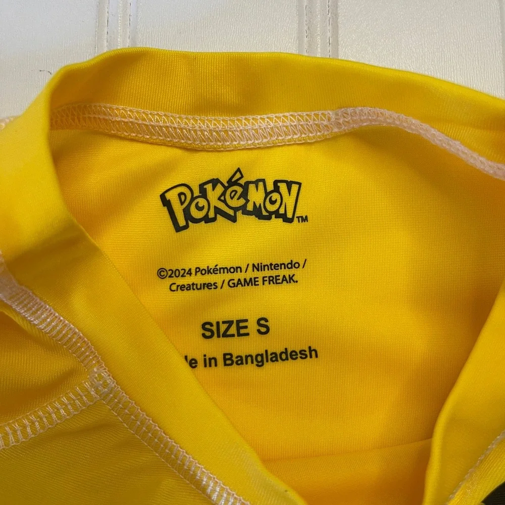NWT Pokemon Pikachu Kids Rash Guard Swim Shirt Yellow UPF 50+ Size Small